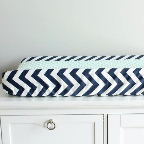 In Stock. Nursery Contour cover navy chevron with mint minky