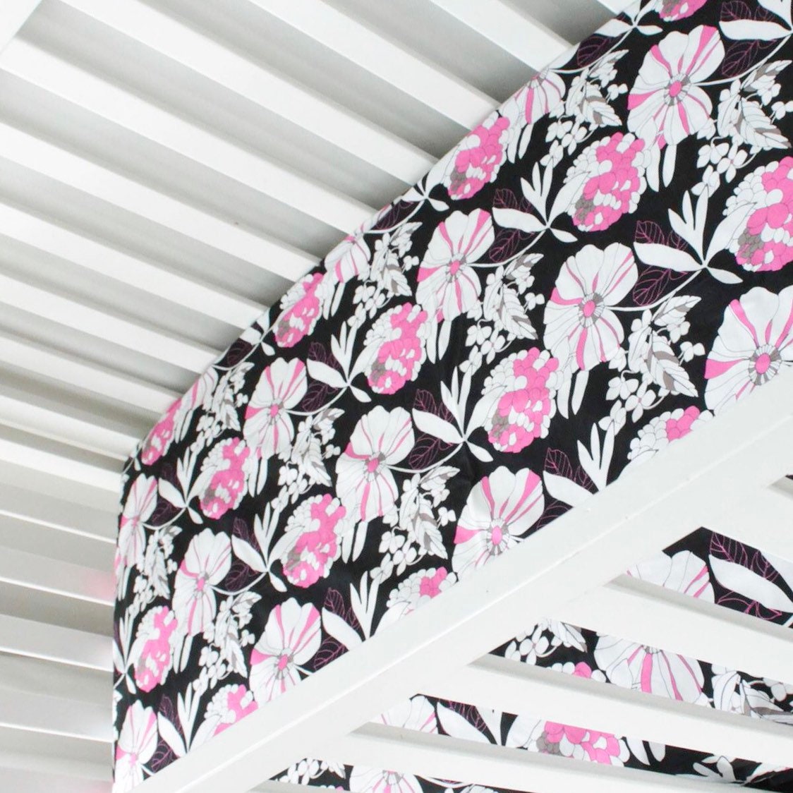 Black and white 3 tiered Crib Skirt. Pink and black floral crib sheet. Nursery bedding. In stock.
