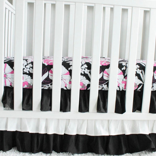 Black and white 3 tiered Crib Skirt. Pink and black floral crib sheet. Nursery bedding. In stock.