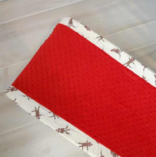 Red Sock Monkey Contour changing pad cover.  Available in many fabric choices.