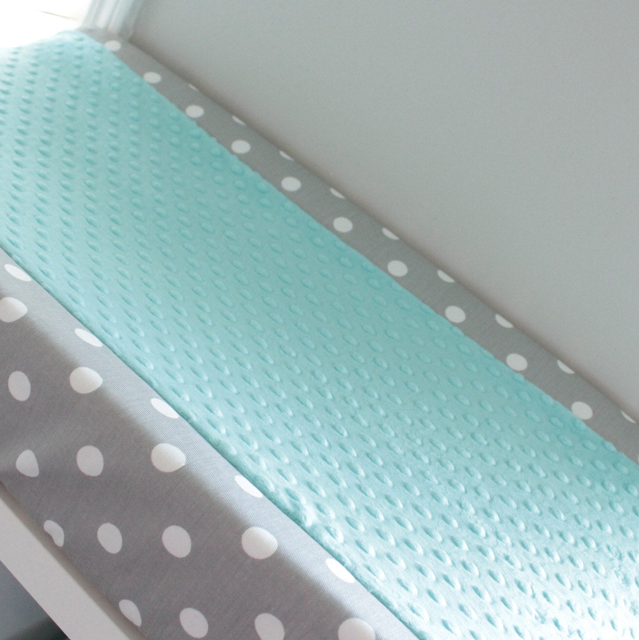 Custom White and Gray polka dot contour cover with accent minky.
